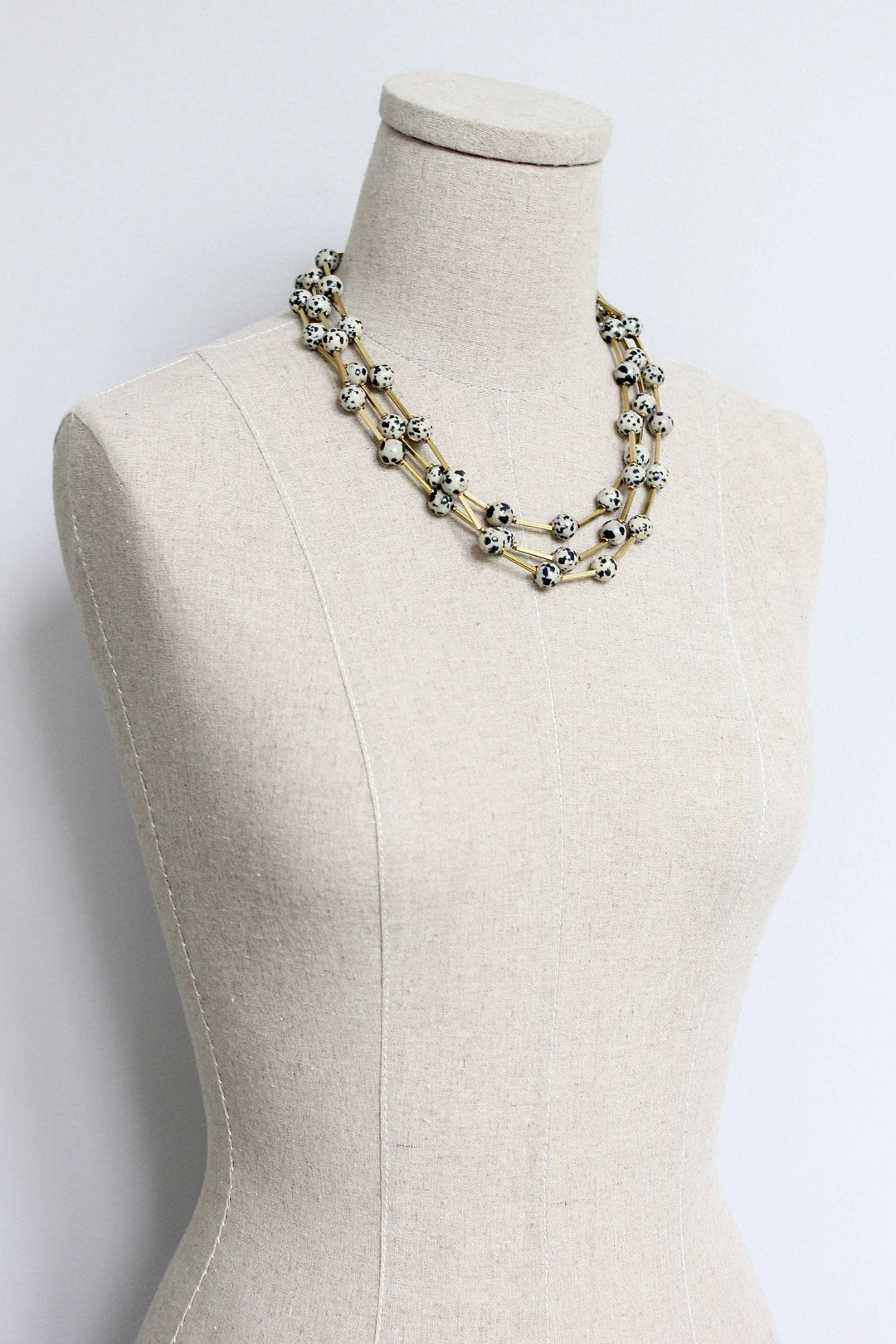 Dalmatian jasper and brass necklace